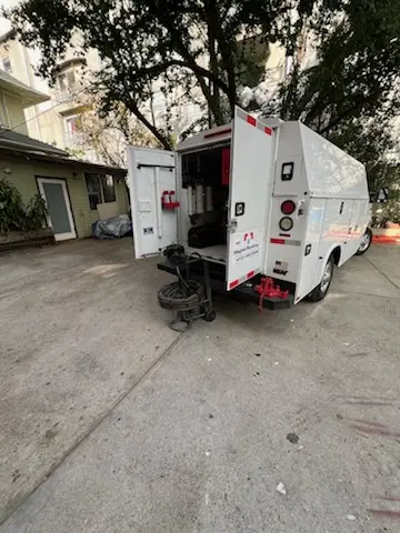 Magnet Plumbing service vehicle on-site for Grease Trap Cleaning in Glen Toro